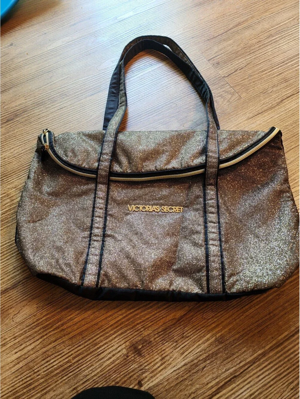 Victoria's Secret Gold Glitter Tote Bag with Black Accents and Dual Handles